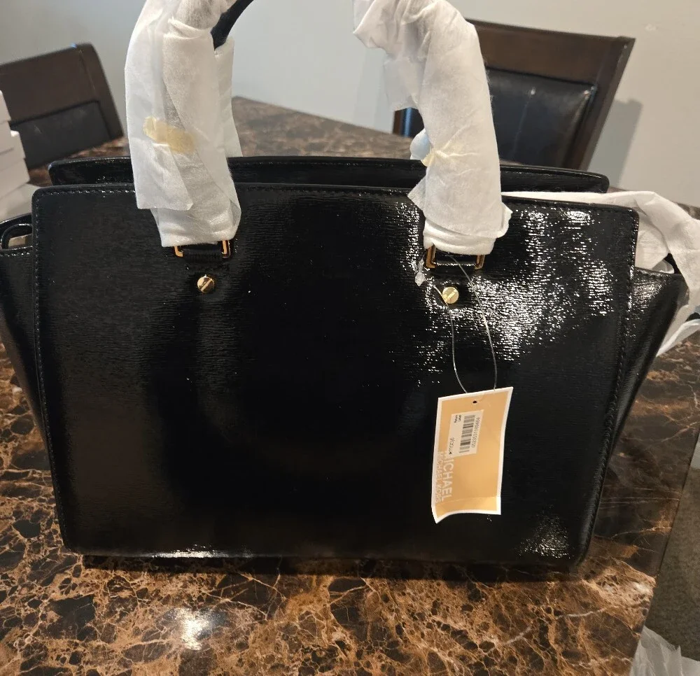 Michael Kors polished patent